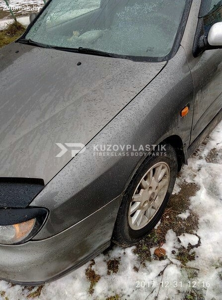 Крыло на Ниссан Primera P11 из стеклопластика.